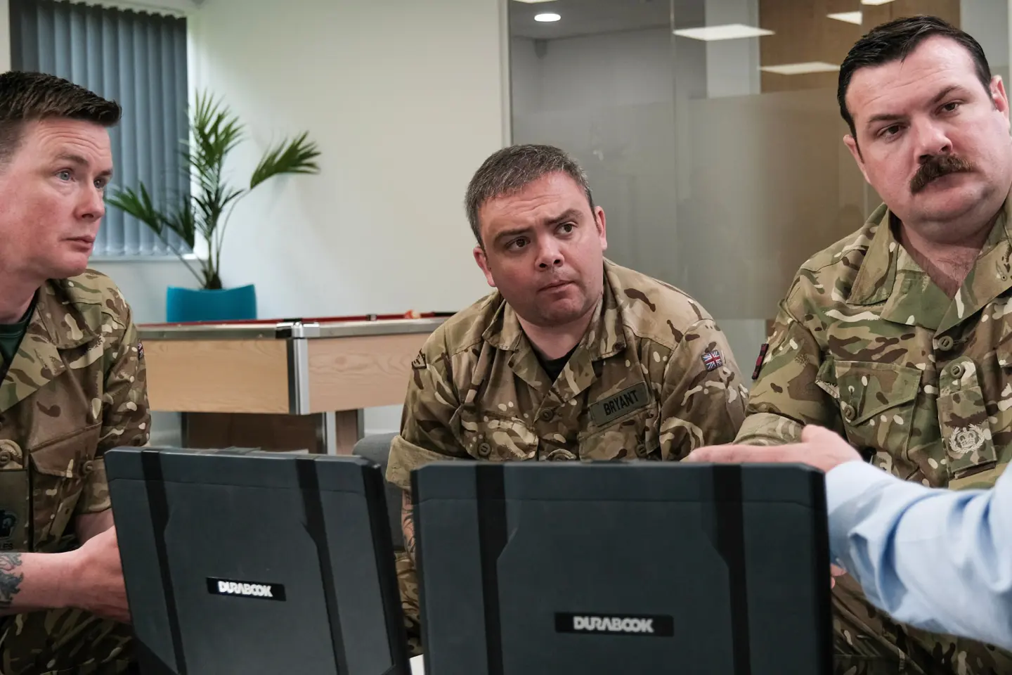UK defence personnel being given a software tutorial by MASS