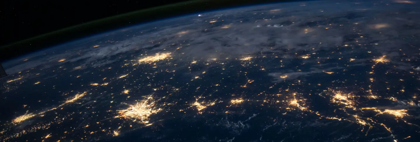 earth from space with cities lit up